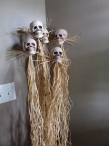 Skull on Bamboo Pole with Thatch